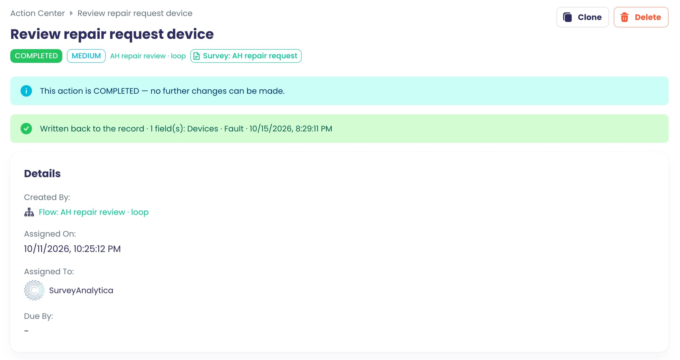 A completed review task showing exactly which field was written back to the record, and when